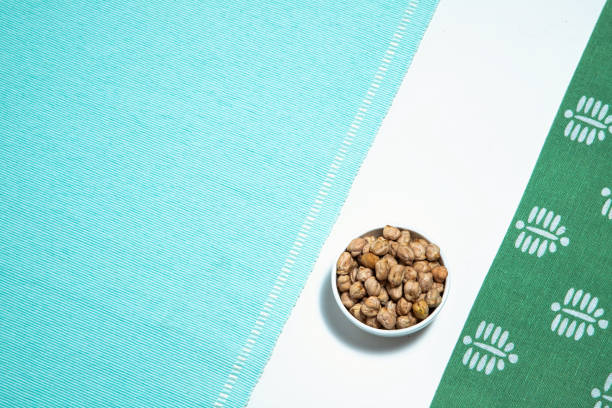 istock The arrangement highlights the organic texture of the legumes while complementing the soft textile elements, creating a visually balanced aesthetic. 2201845479