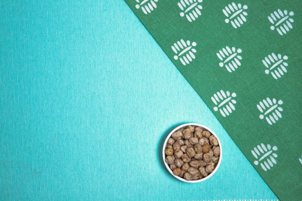 istock The arrangement highlights the organic texture of the legumes while complementing the soft textile elements, creating a visually balanced aesthetic. 2201845541