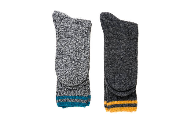 istock Top view of grey woolen winter socks on white background 2201845646