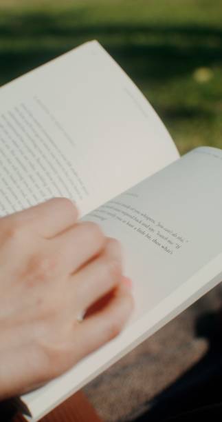 istock The book is in women's hands 2201849117