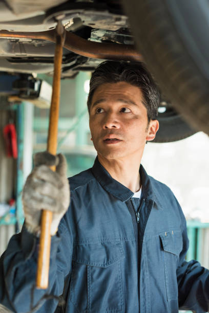 istock Middle-aged male auto mechanic 2201849352