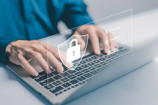 istock laptop shows the icon lock shield for cybersecurity. concept of secure privacy data, protect cybercrime attacks. security of information servers and network systems. password safe for business 2201849566