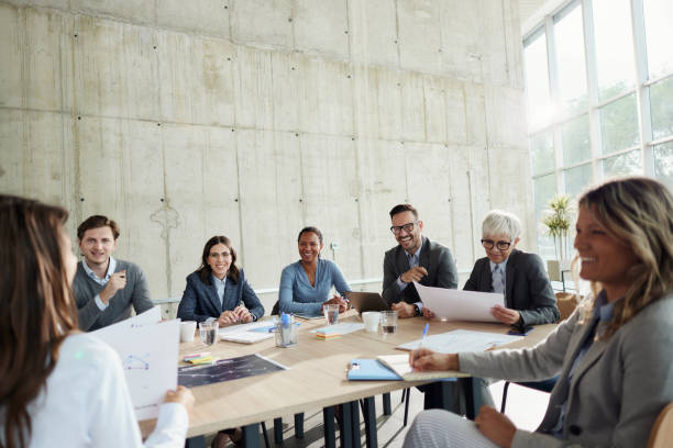 istock Happy business team having a meeting in the office. 2201851116
