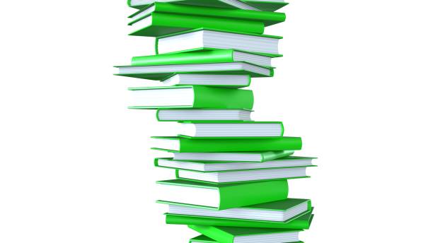 istock Stacked gold books isolated on white background. 2201852184