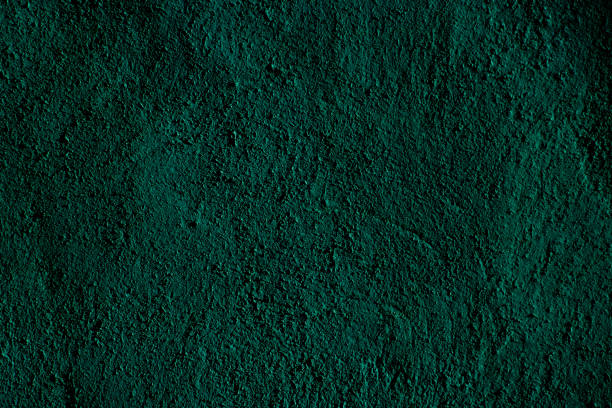 istock Teal colored abstract wall background with textures of different shades of teal 2201852608