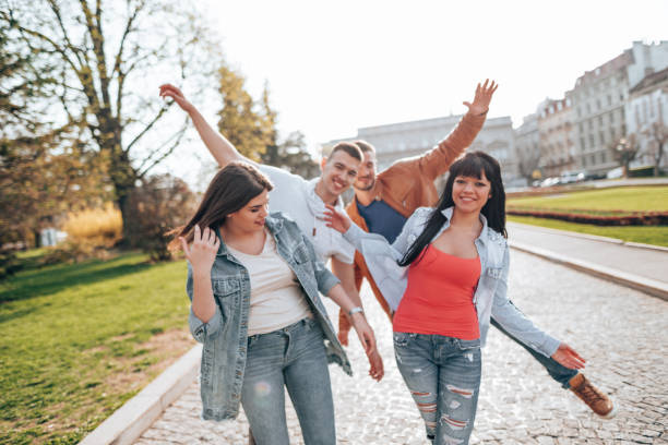 istock happiness friends having fun on the city 2201856382