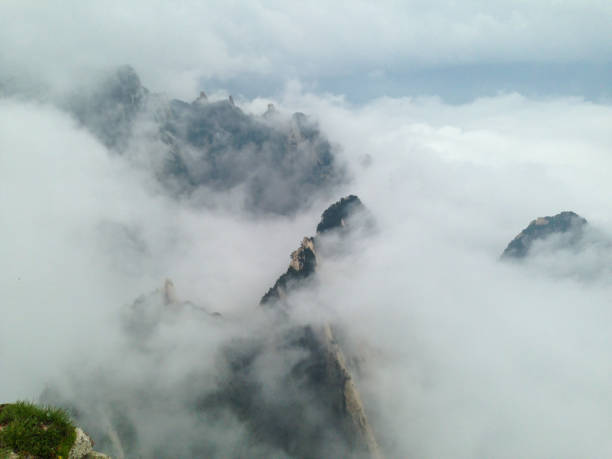 istock The Unmissable Huashan Mountain in Clouds, China 2201856451