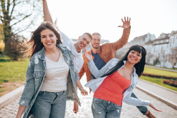 istock happiness friends having fun on the city 2201856459