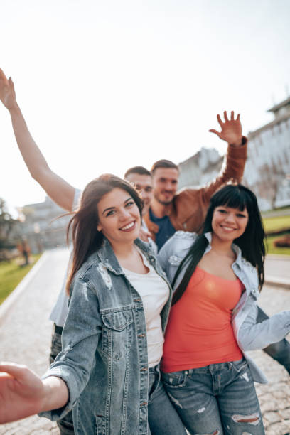 istock happiness friends having fun on the city 2201856584