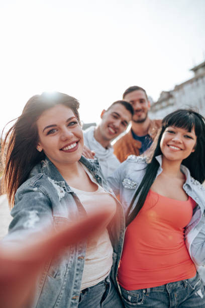 istock happiness friends having fun on the city 2201856744