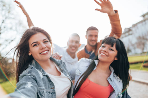 istock happiness friends having fun on the city 2201856780