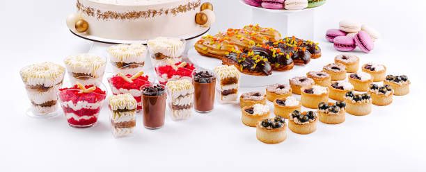 istock Celebration dessert table featuring a teddy bear cake and assorted sweet treats for a special occasion 2201857114