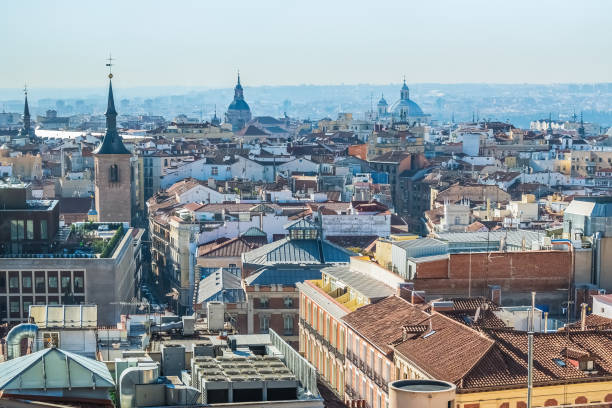 istock Panoramic view of Madrid historic center with a focus on traditional rooftops, churches, and iconic domes 2201859328