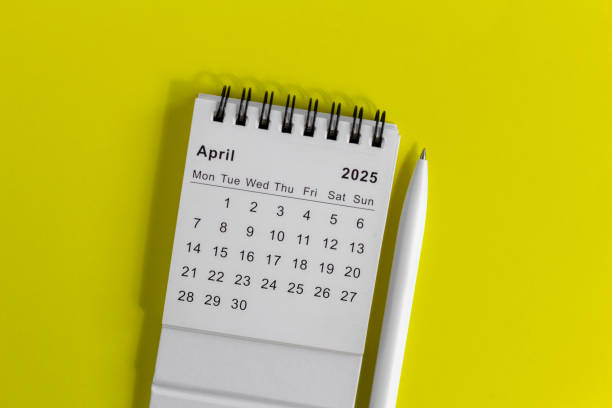 istock April calendar for 2025. Bright yellow background. 2201859559