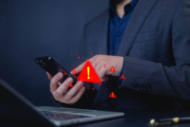 istock System hacked warning alert alarm on laptop. Notification virus of hackercrime, Cyber security and cybercrime, Spyware, Malware or Malicious software. 2201860454