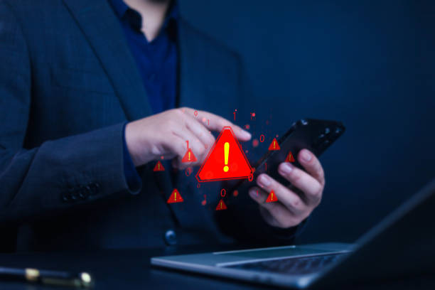 istock System hacked warning alert alarm on laptop. Notification virus of hackercrime, Cyber security and cybercrime, Spyware, Malware or Malicious software. 2201860459