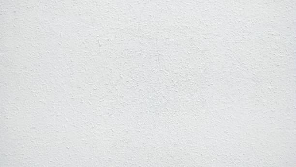 istock White wall on the background. The​ pattern​ of​ surface​ wall​ concrete​ for​ background. Abstract​ of​ surface​ wall​ concrete​ for​ vintage​ background. 2201860594