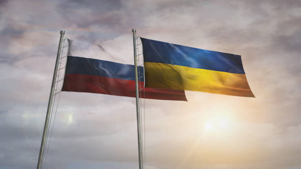 istock Ukraine and Russia waving flags 3d illustration 2201862321