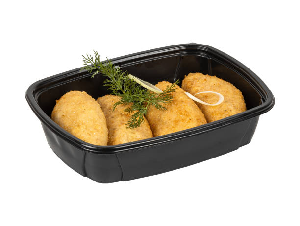 istock A black container of fried food on a white background 2201863650