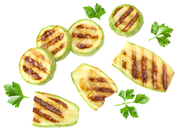 istock grilled sliced zucchini isolated on white background. clipping path 2201865547