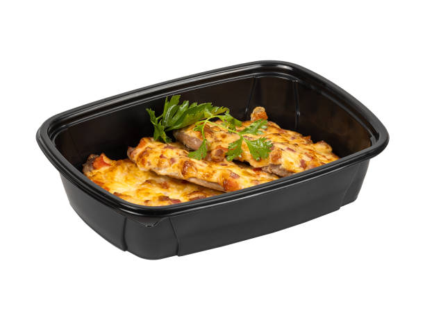 istock A black container filled with food on a white background 2201866477