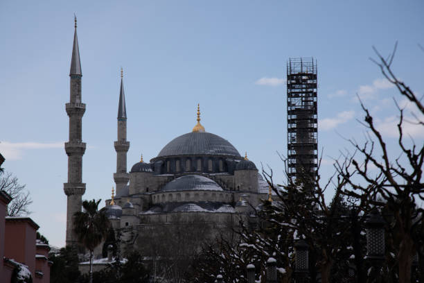 Sultan Ahmed Mosque, also known as the Blue Mosque, is depicted in winter.