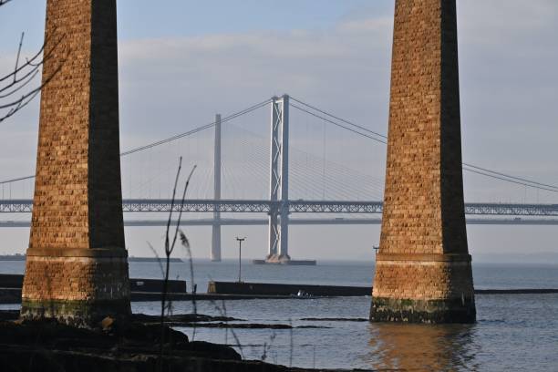 istock Queensferry Crossing framed by stone pillars 2201872614