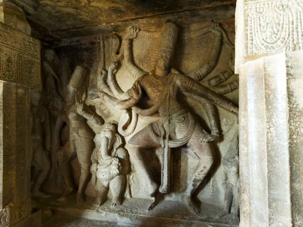 istock Shiva as Nataraja sculpture, Ravanaphadi Cave, Aihole, Karnataka, India 2201873310