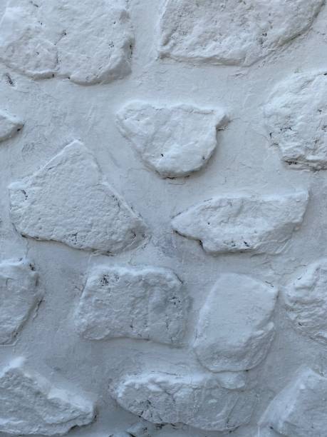 istock Stone wall texture with natural rocks, rugged surfaces, and earthy tones. Perfect for backgrounds, architecture, and 3D renders. Ideal for projects needing masonry, stacked stones, or rustic stone surfaces with an organic, timeless feel 2201873561
