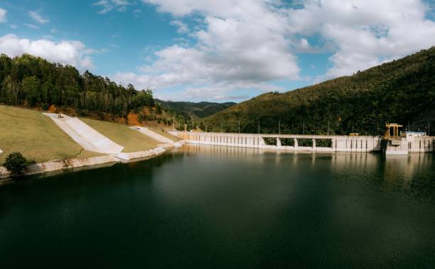istock Scenic Dam with Lush Green Hills 2201875278