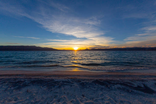 Silhouette of Pine Trees by Emerald Bay in Lake Tahoe California at dusk