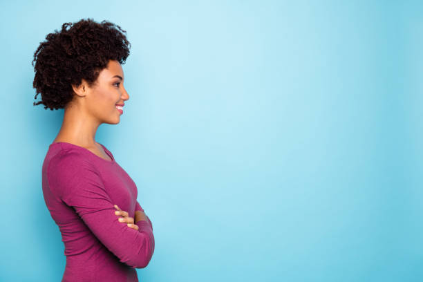 istock Photo of creative smart nice cute attractive girlfriend standing confidently with hands folded looking at empty space smiling toothily isolated over blue vivid color background 2201877152