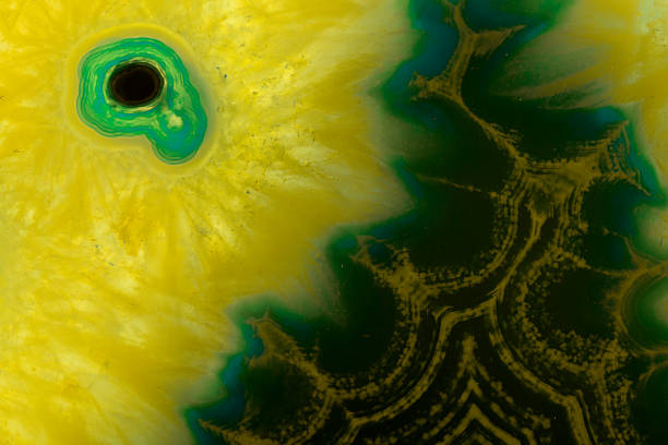 Agate macro detail. close-up of a textured semi-precious gemstone background. backlight transparency