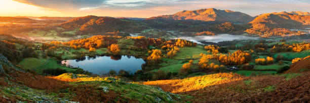 istock Autumn morning at Loughrigg Tarn, Lake District, UK. 2201881695