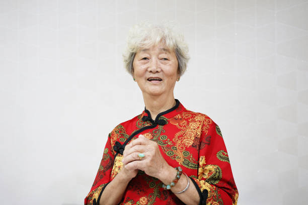 Portrait of an Asian senior woman dressed in traditional Chinese attire