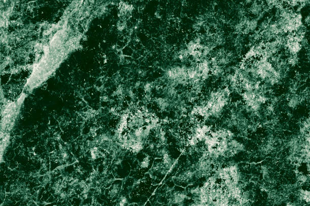 istock Real closeup of dark green marble stone texture surface background. Design pattern with high resolution for luxury home decoration. Abstract matt slab rock material. Front view of natural tiles stone surface. 2201882017
