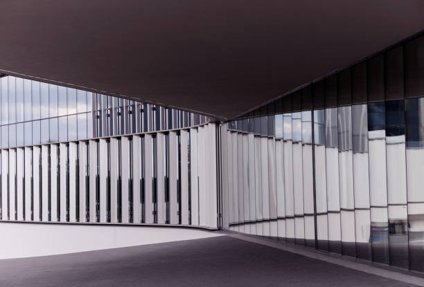 Abstract steel and glass facade detail background of commercial building. Business architecture