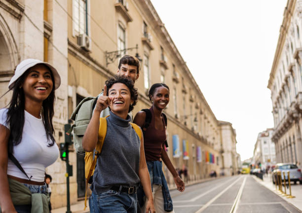 istock Young tourists exploring lisbon, portugal, on foot 2201884681