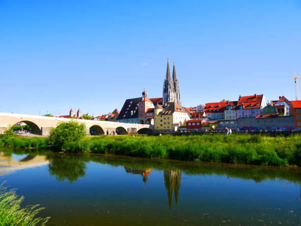 istock Regensburg, Germany: The cityscape is reflected in the Danube river 2201887036