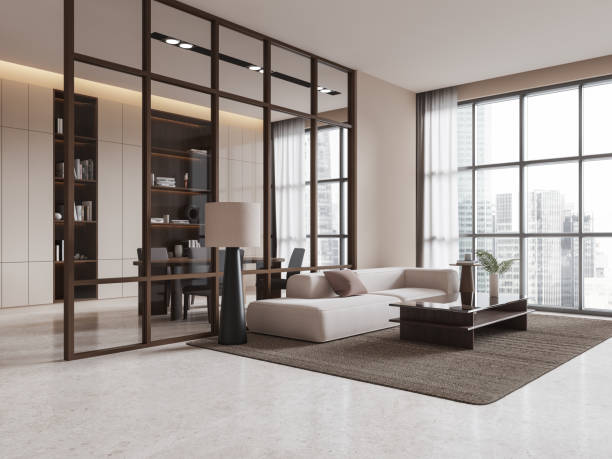 istock Modern living room with blank wall for mockup purposes, featuring open shelving, sofa, and large windows. 3D Rendering 2201888120