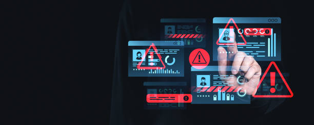 istock Cybersecurity warning interface with red alert symbols on digital identity screens. 2201888396