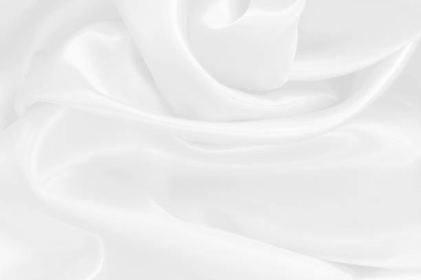 istock White fabric texture background, detail of silk or linen pattern. 2201888489