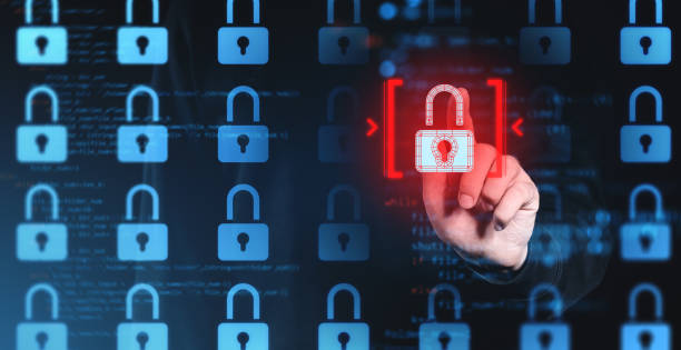 istock Cybersecurity concept with glowing red padlock among blue locks on digital screen. 2201889282