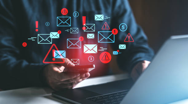istock Digital spam and notifications concept with email icons on screen. 2201889387