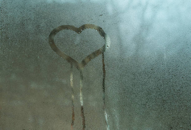 istock heart is painted on the glass. 2201890256