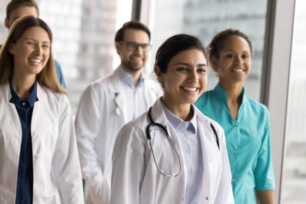 istock Group of diverse doctors posing together in clinic office 2201891035