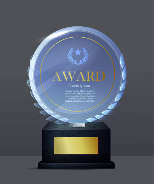 istock Glass award trophy. Transparent prize template with gold lettering for awarding winners in competition. First place reward. Realistic 3D vector illustration 2201894921