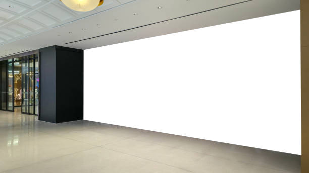 istock blank billboard in a modern shopping mall, perfect advertising space with large white wall for commercial promotions, marketing displays, and digital signage, high-traffic retail area 2201896300