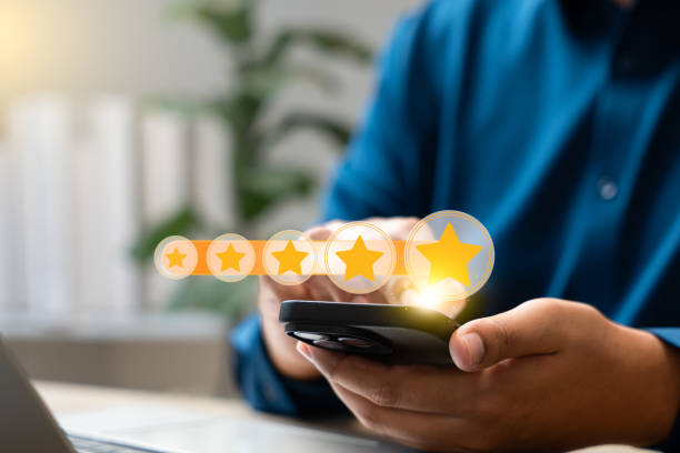 istock Experience excellent customer service, User give five star rating on online application, Positive feedback, Happy, Smiley face icon. Customer Reviews in Digital Survey, Satisfaction. 2201898376