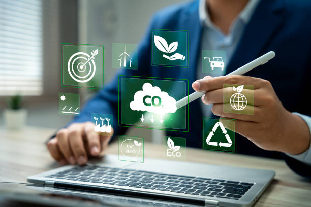 istock CO2 reduction, CO2 emissions impact, Businessman analyzing carbon footprint and sustainable solutions for global warming mitigation, Business solutions for reducing CO2 emissions, renewable energy. 2201899023